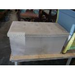 Beige upholstered ottoman