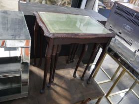 Nest of 3 mahogany effect coffee tables with green leather surfaces