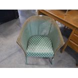 Green and gilt Lloyd Loom armchair