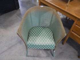 Green and gilt Lloyd Loom armchair