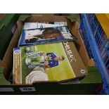Crate containing various Chelsea football programmes from 2004 to 2005