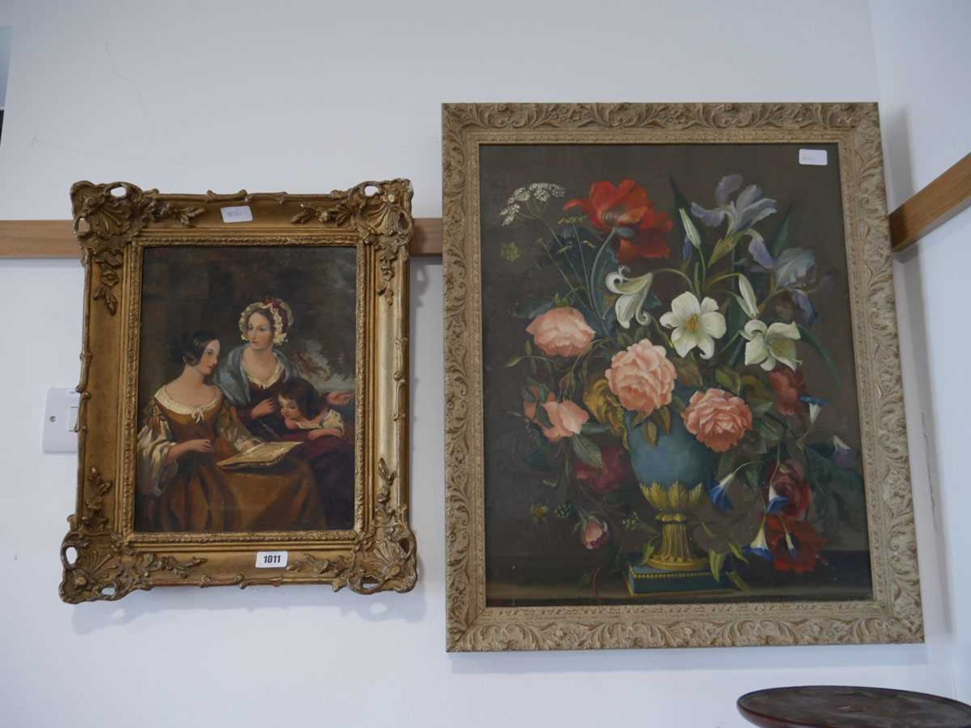 Oil painting of 2 women and a girl in gilt frame with floral still life