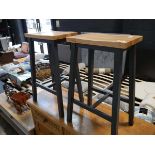 Modern pair of grey bar height stools with oak effect surfaces