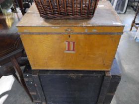 Twin handled metal travel trunk, together with a wooden storage trunk