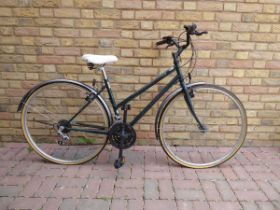 Town bike in green and silver