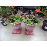 Pair of pre-planted plastic urn style planters containing mixed plants