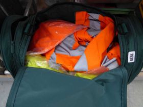Bag containing a qty of various high vis work wear