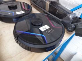 +VAT Eufy robotic vacuum cleaner with charger and dock, together with an Eufy cordless vacuum
