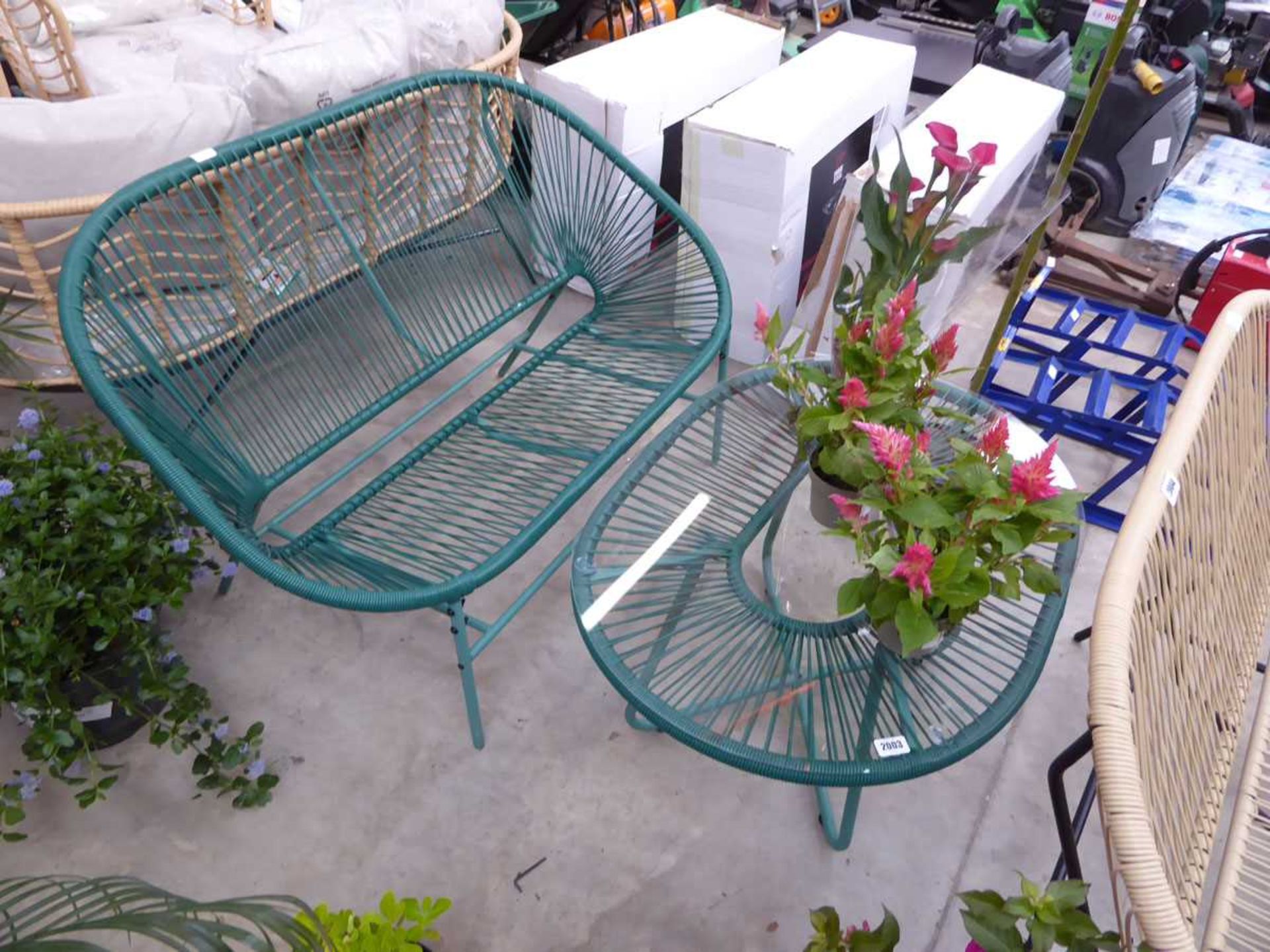 Green rope effect garden 2 seater sofa together with a matching glass top oval shape coffee table