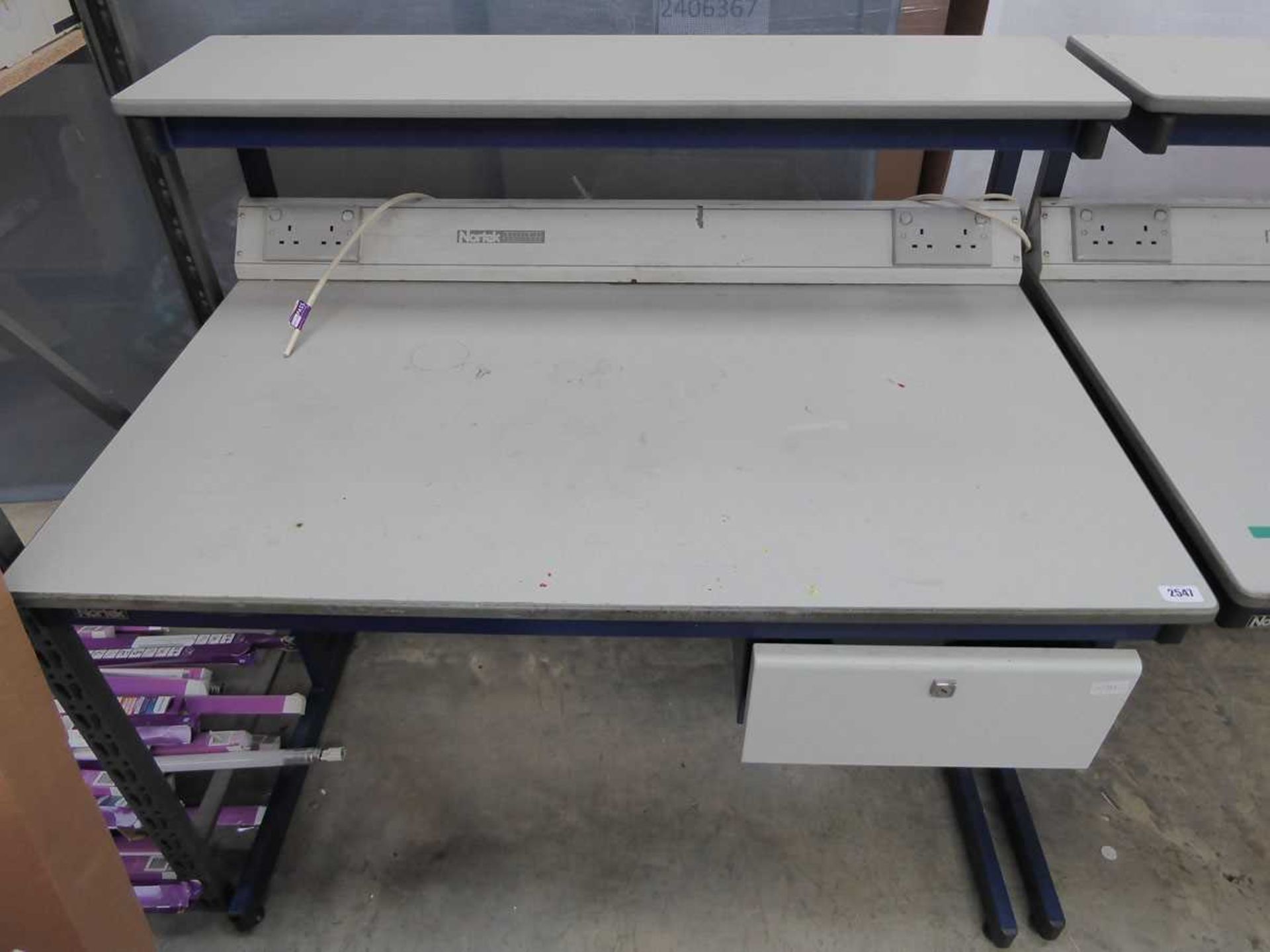 Nortek single drawer work bench with integral sockets and lighting