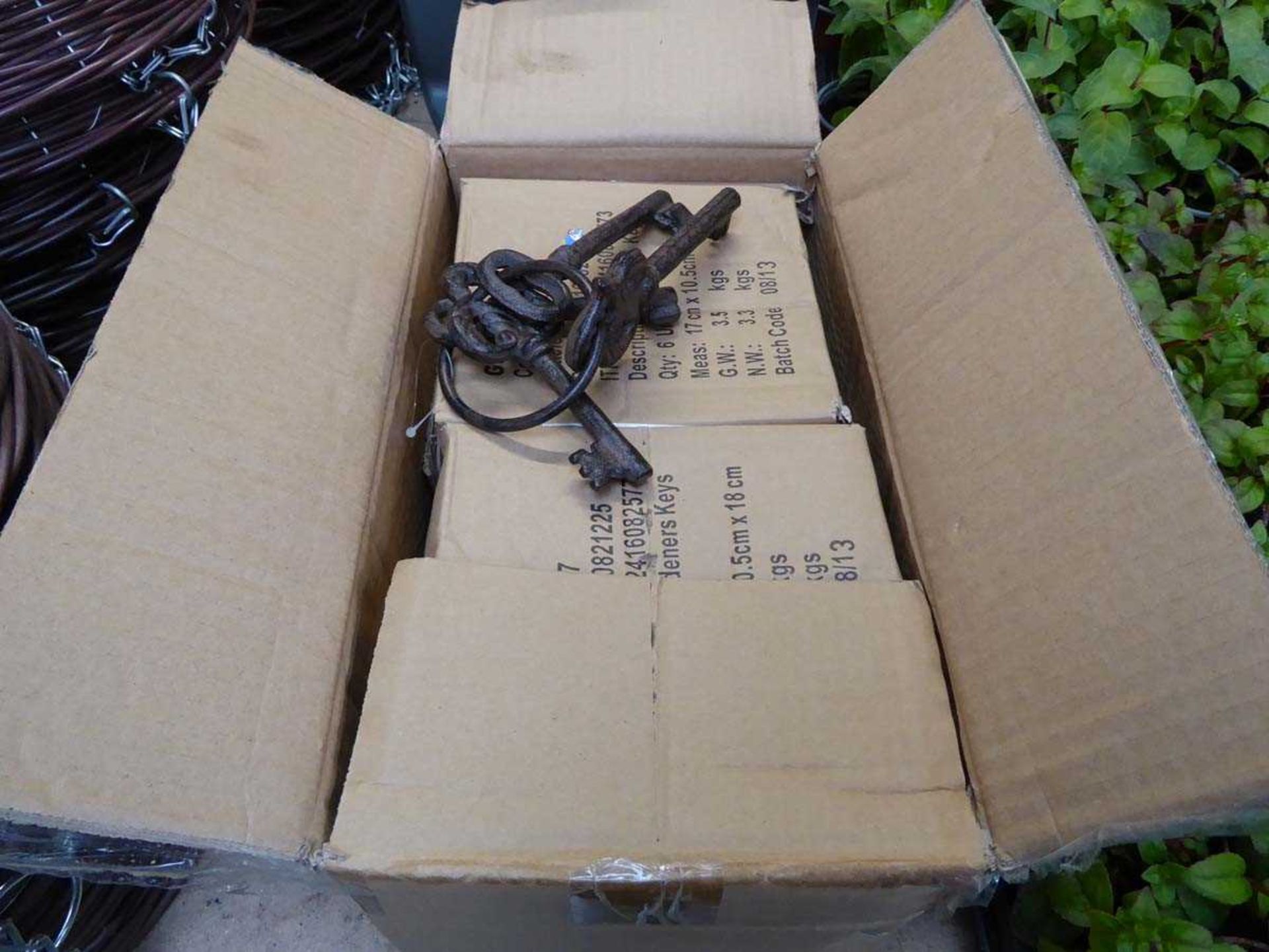 Box containing approx. 24 sets of modern reproduction cast iron gardeners keys