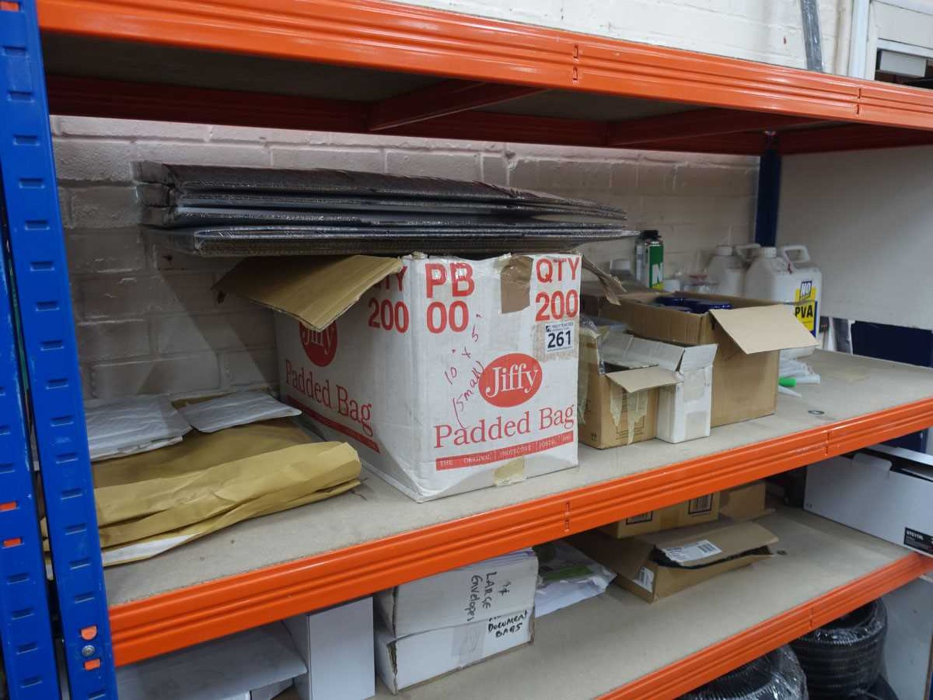 +VAT Miscellaneous packing, spray adhesive, staples etc. (on two shelves)