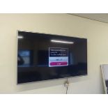 +VAT LG flat screen TV with remote control