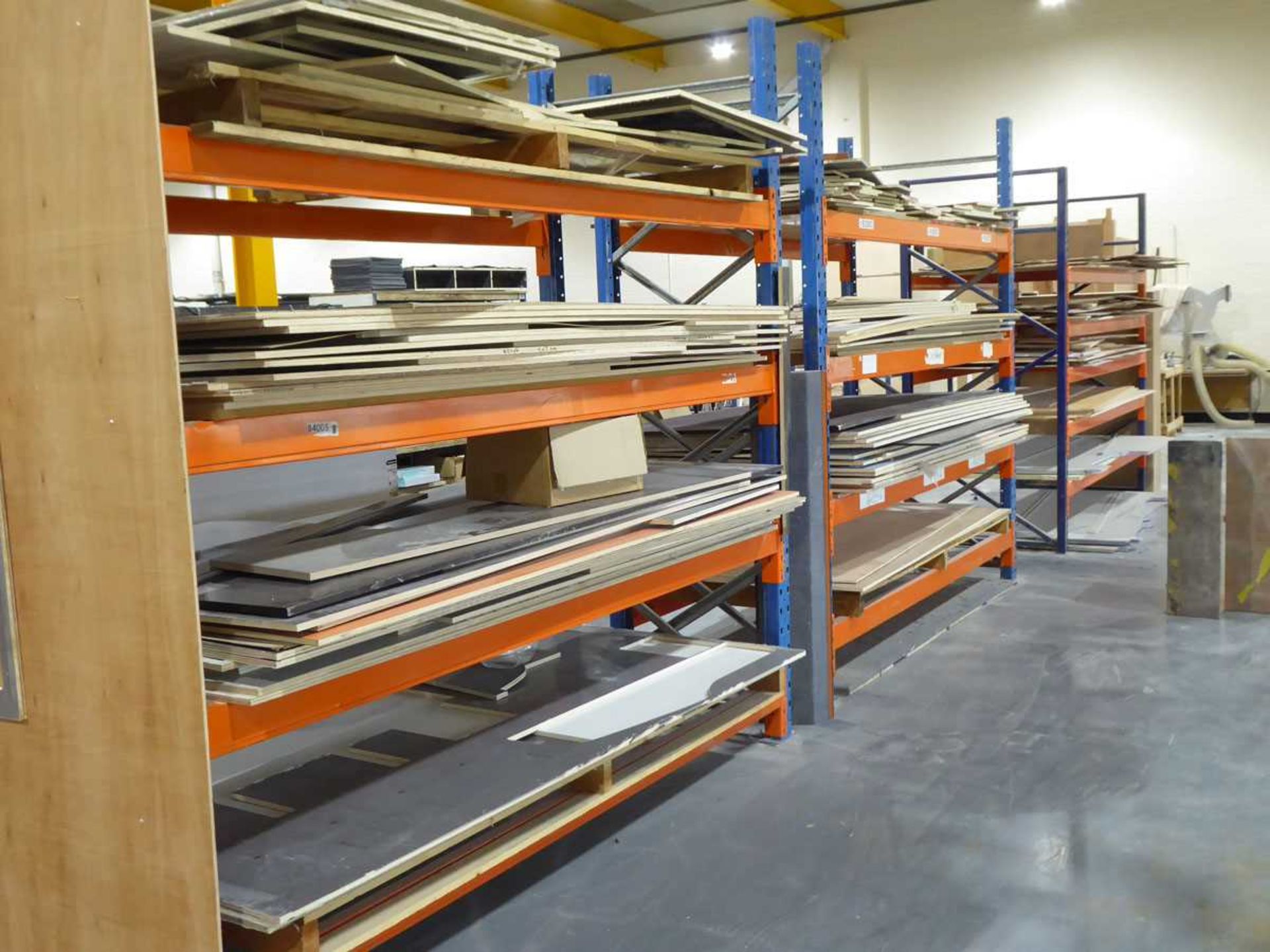 +VAT 4 blue and orange heavy duty pallet racks comprising of 8 uprights and 34 orange beams. Each