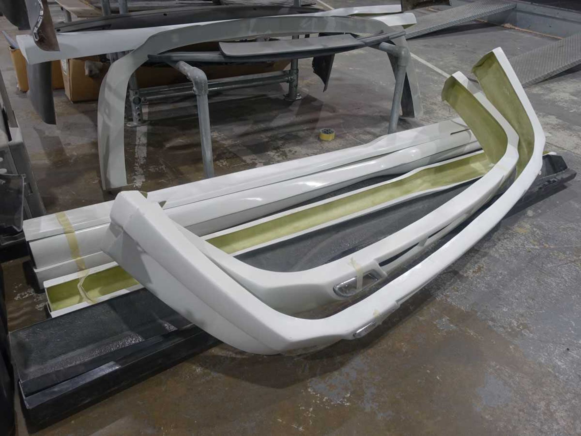 +VAT Two galvanised cantilever racks containing a range of fibreglass panels and skirts - Image 2 of 5