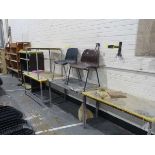 +VAT Four metal framed worktables, metal open cupboard and three plywood shelves