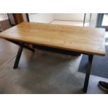 Light oak topped dining table on metal crisscross supports (170 x 81 x 76cm)