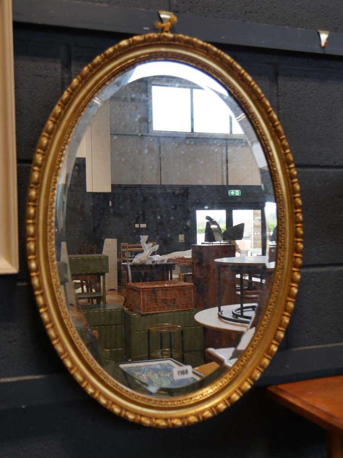 Gilt framed and bevelled oval wall mirror - Image 2 of 2