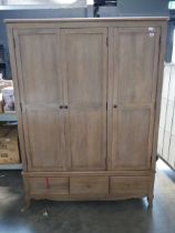 Modern hardwood finish triple fronted wardrobe with 3 drawers to base