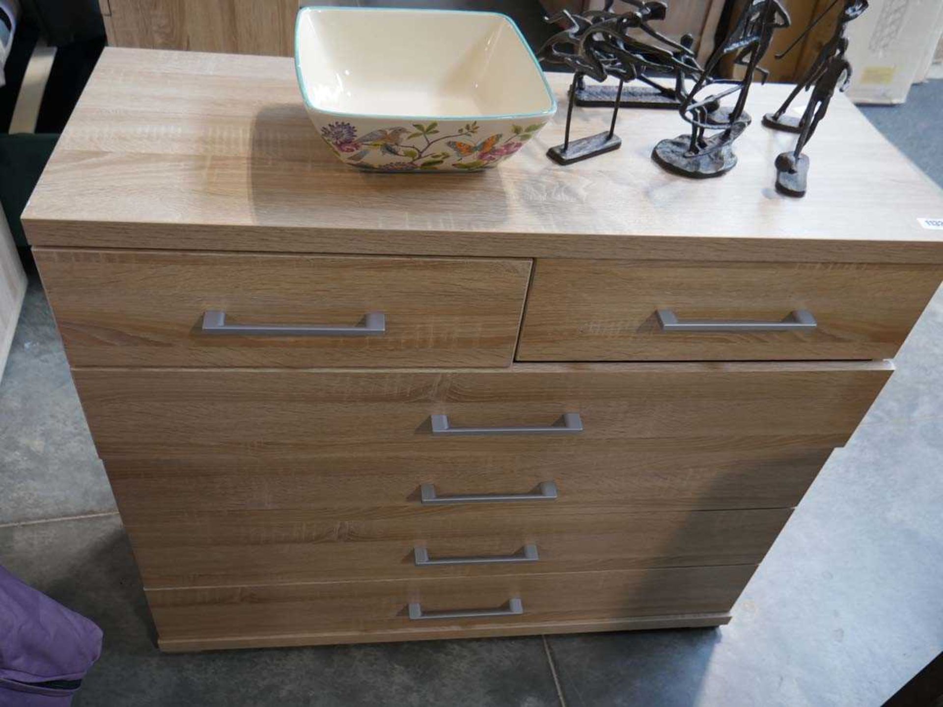 Ash finish bedroom suite comprising chest of 2 over 4 drawer, 5 drawer tall boy and 3 drawer