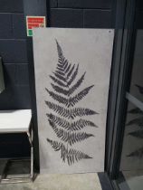 Large piece of wall art with a fern pattern