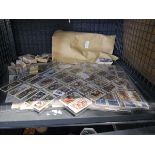 Cage containing various cigarette cards and tea cards
