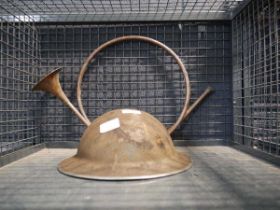 Vintage metal helmet with French hunting horn