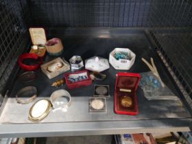 Cage containing mixed items incl. 2 cased 5 shillings coins, Franklin Mint Tokyo pendant, and