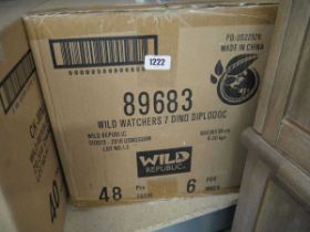 Box containing Wild Republic dinosaur soft toys