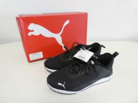 +VAT Boxed pair of Puma trainers in black. Size 8