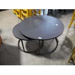 Nesting pair of black ash finish circular coffee tables