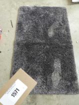 +VAT Grey fluffy mat/rug