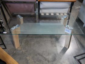 Rectangular glass top coffee table with shelf under