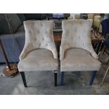 2 light brown upholstered chairs on wood effect legs