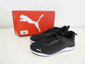 +VAT Boxed pair of Puma trainers in black. Size 12