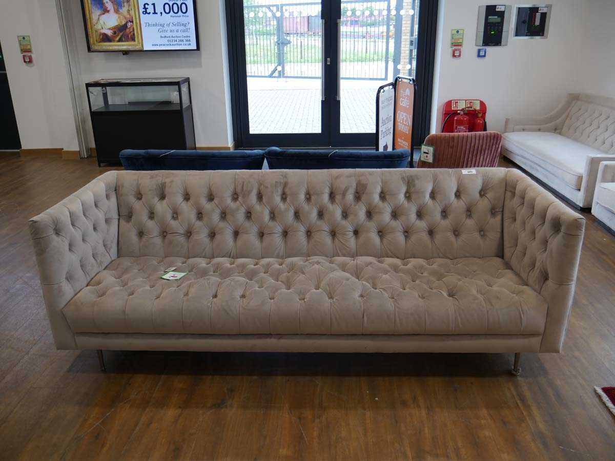 +VAT Modern light grey sofa on brushed chrome tapered supports upholstered in button back finish