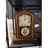 Wooden cased 8 Day Spring Clock with painted glass frontispiece, by Seth Thomas