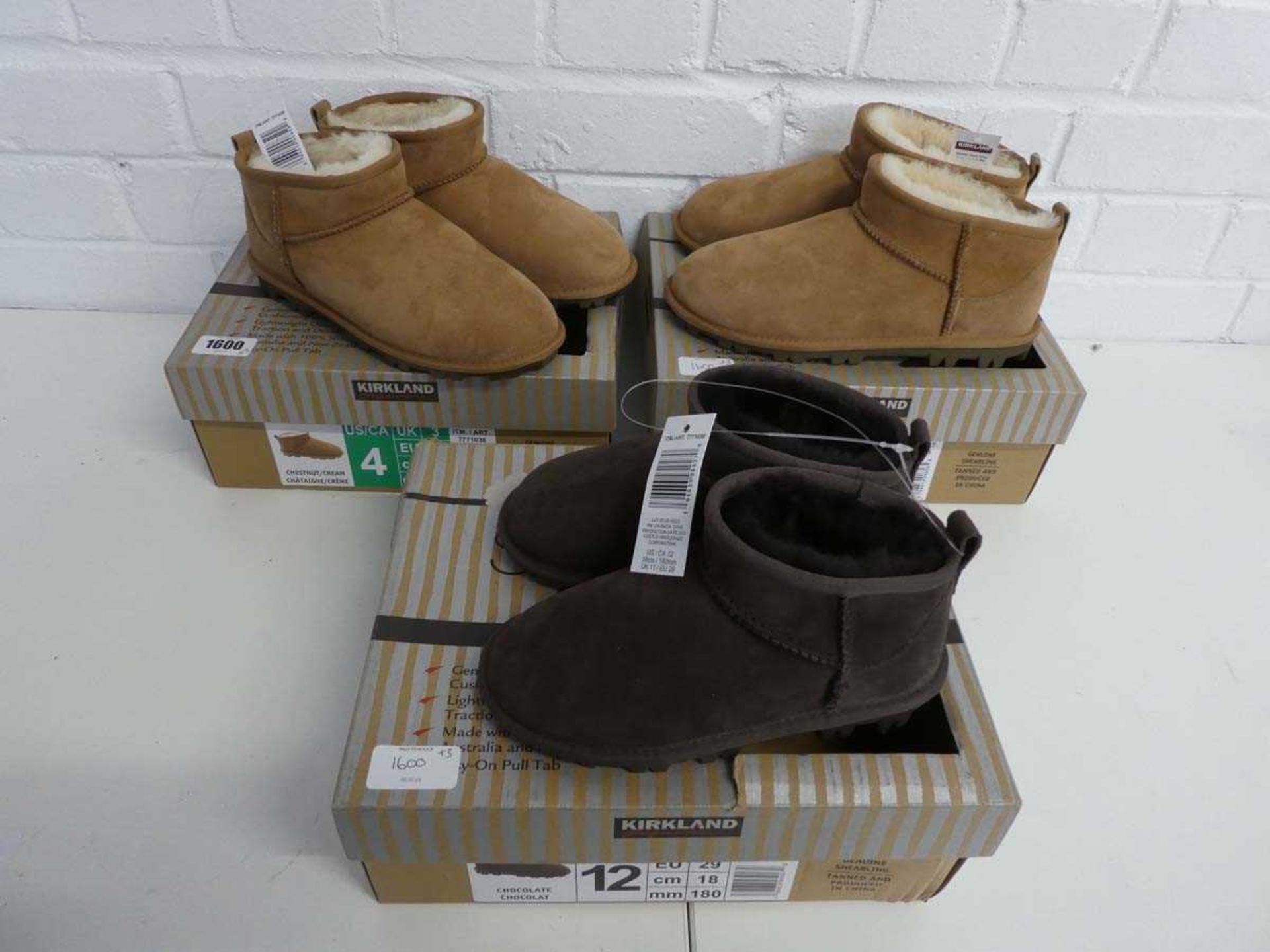 3 boxed pairs of kids kirkland shearling ankle boots (2 chestnut - size 3&4. 1 brown size 11)