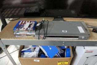 Sony DVD player with remote control and various DVDs