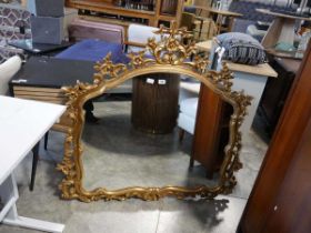 Large ornate gilt framed over mantle wall mirror