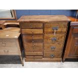 Modern hardwood storage chest with 8 slim drawers and 4 deep drawers