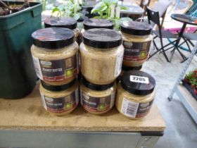 11 tubs of bird peanut butter