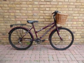 Challenge Meander ladies bike in purple with basket on front