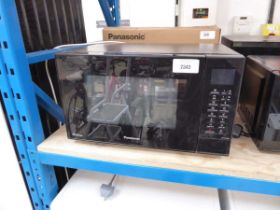 +VAT Unboxed Panasonic convection/ grill/ microwave oven in black (NN-CT56JB)