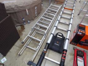 2 mixed size extending ladders