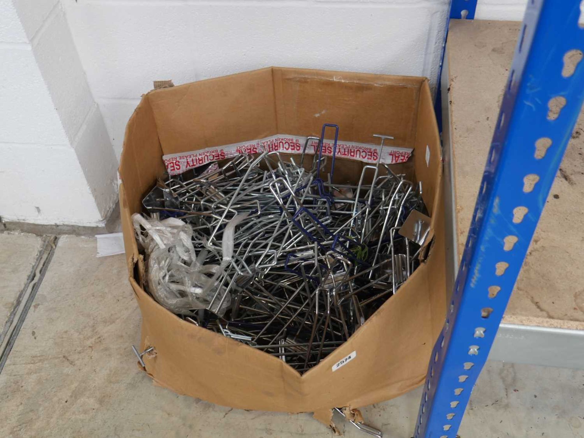 Box containing quantity of metal retail shop fittings