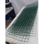 Quantity of green mesh trellis panels