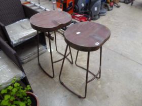 Pair of wooden topped stools on metal tubular legs