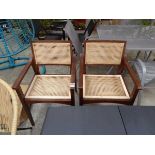 Pair of wooden garden armchairs with cane inserts
