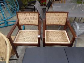 Pair of wooden garden armchairs with cane inserts